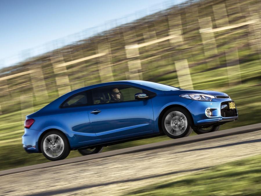  Kia Cerato Koup 2013 года  (AU) (фото 7 из 20)